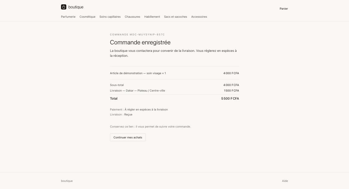 An order confirmation with its reference, the itemised total, the payment and delivery status, and a tracking link